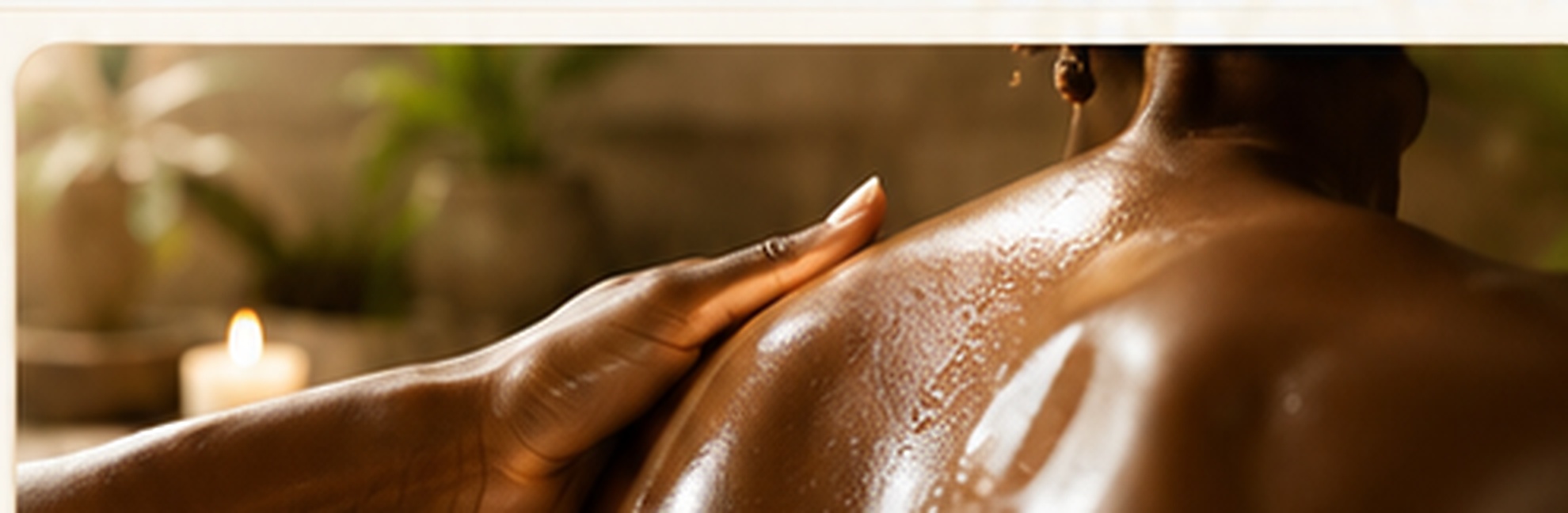 Massage oil being applied to the upper back